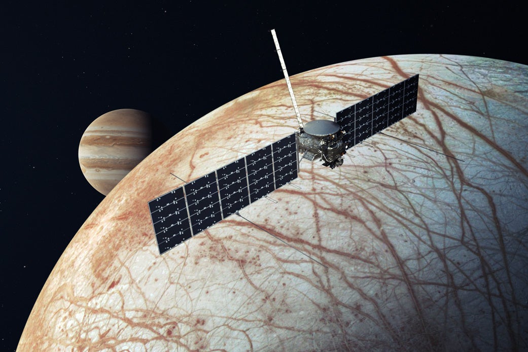 An illustration of NASA’s Europa Clipper mission encountering its namesake target, an icy, ocean-bearing moon of Jupiter.